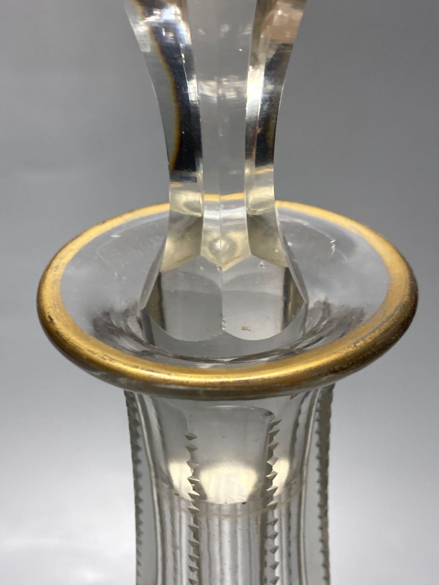 A pair of tall Bohemian cut glass decanters with faceted stoppers, unsigned, 35cm